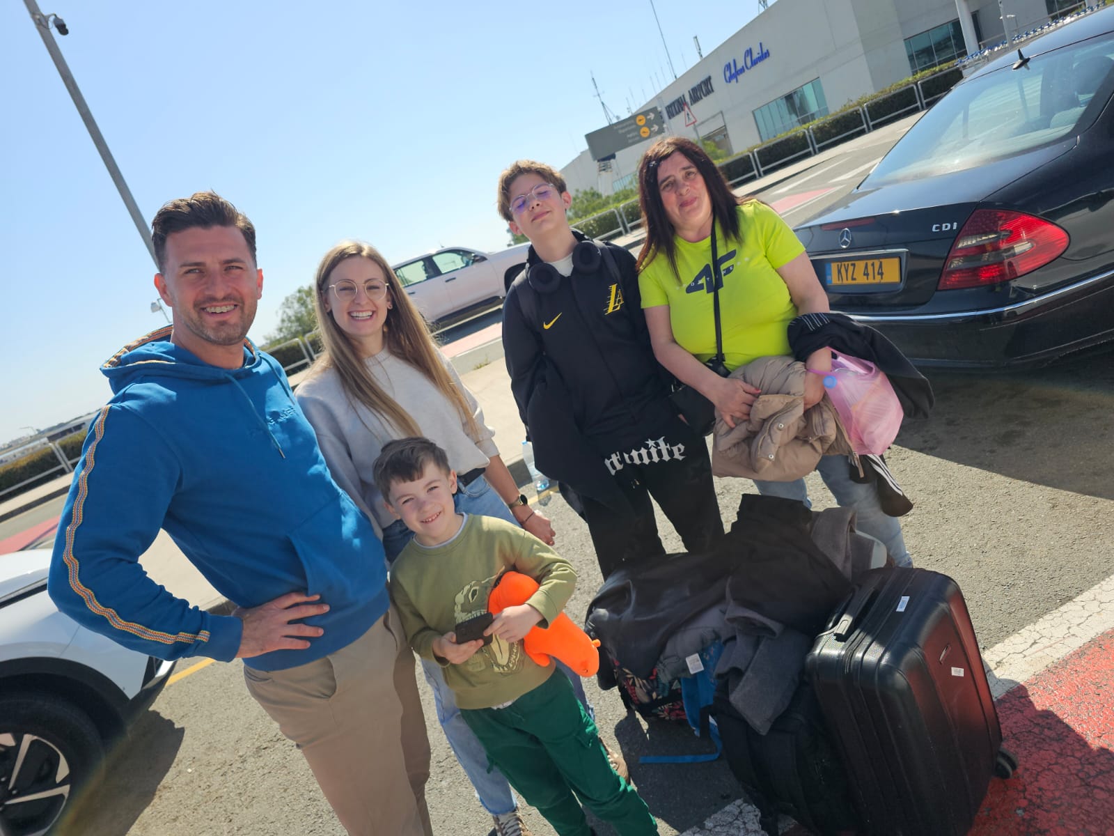 Family at airport pickup